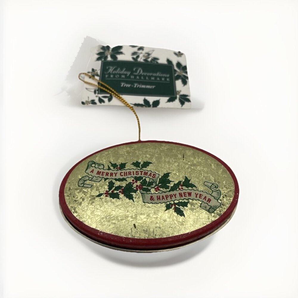 Vintage Holiday Decoration Hallmark Tree Trimmer Oval 3” Gold Holly Tin Ornament